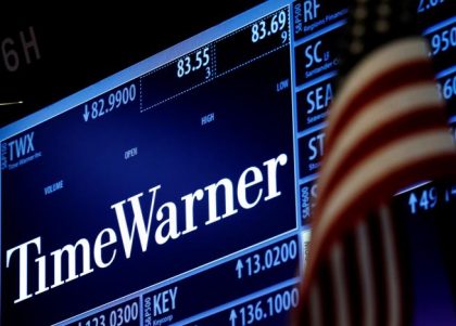 Ticker and trading information for media conglomerate Time Warner Inc. is displayed at the post where it is traded on the floor of the New York Stock Exchange in New York City