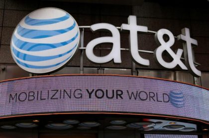 File photo of the signage for an AT&T store is seen in New York